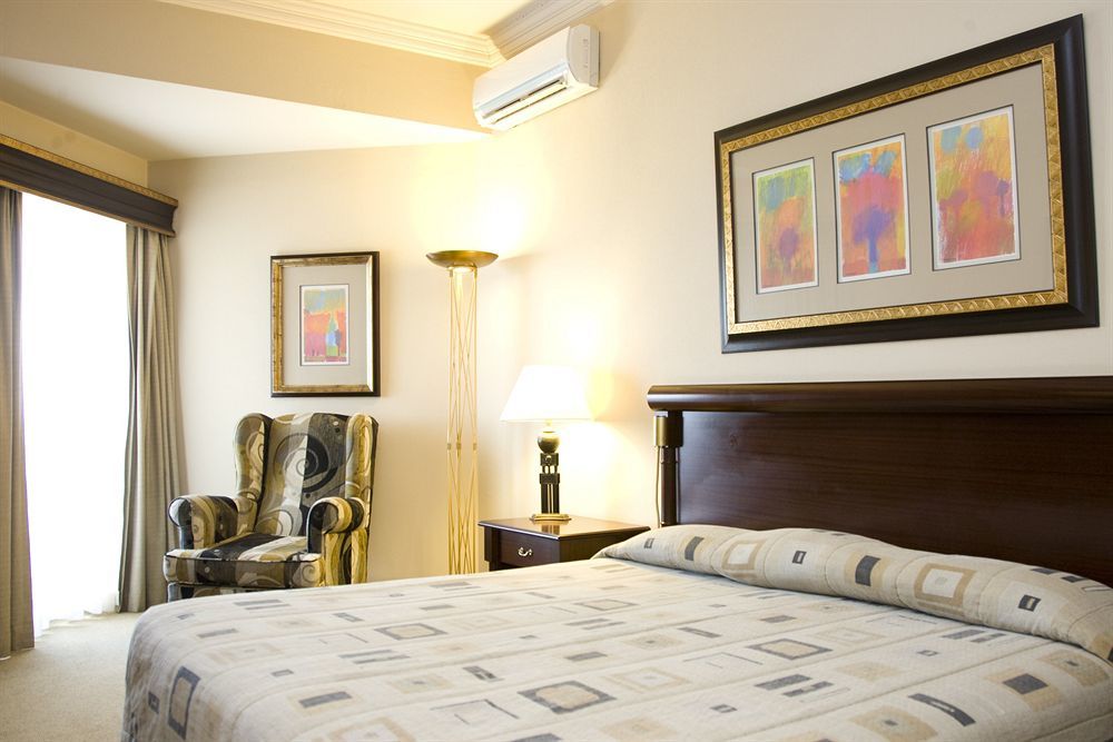 Hotel Alvalade Луанда  Номер фото